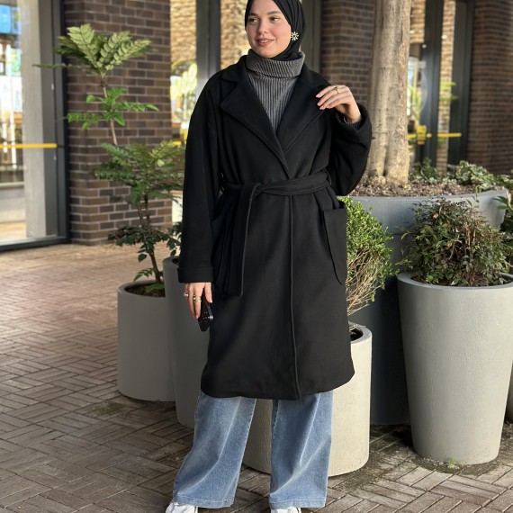 http://www.capricieuse.tn/fr/products/manteau-longue-noir-1